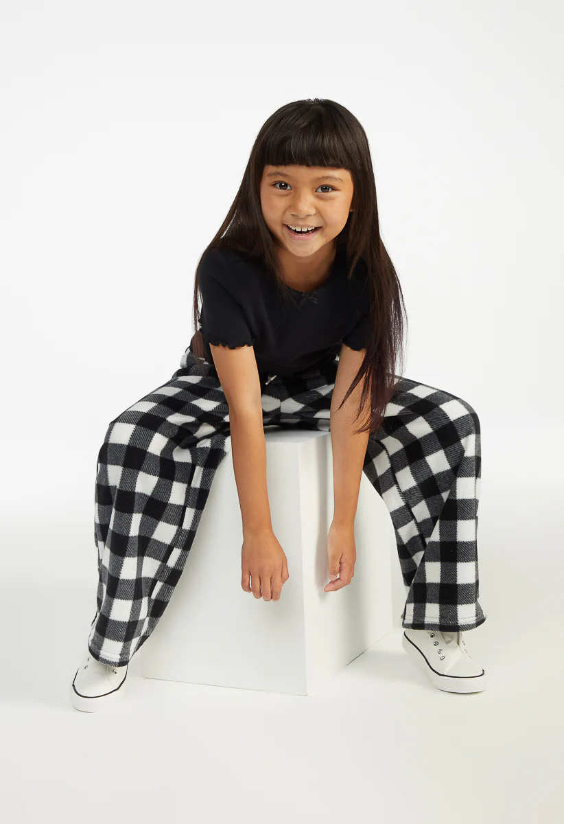 Fun in Plaid Outfit - Image 3